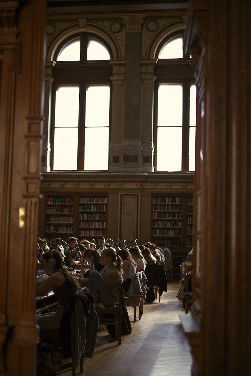 Alumni reading in the library